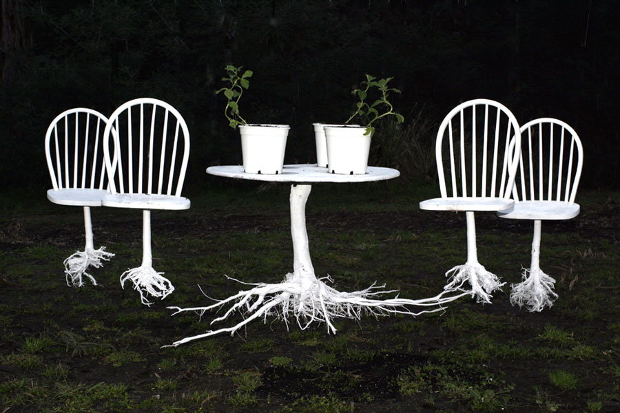 deconstructed chairs, table top, tree roots, plants, Lloyd Godman