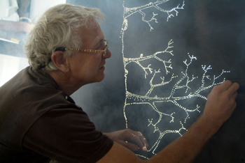 Lloyd Godman working on Carbon Obscura
