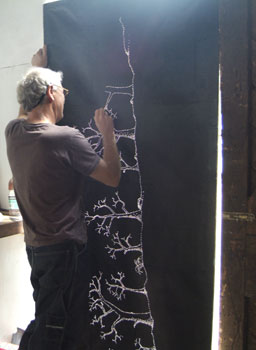 Lloyd Godman pricking the holes for  Carbon Obscura