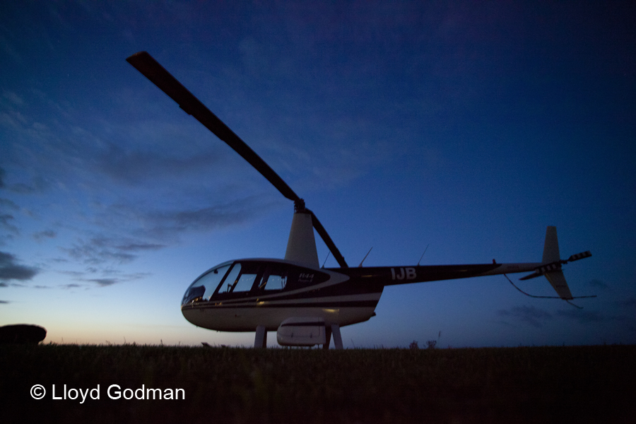 Helicopter, dusk, Hasst, New Zealand - photograph © Lloyd Godman
